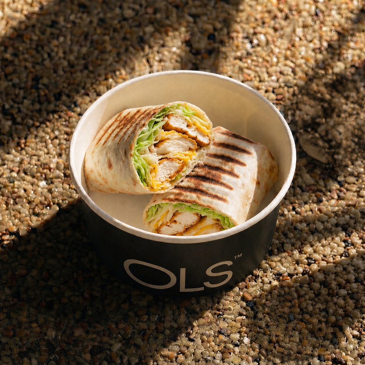 Power Chicken Tortilla — A toasted tortilla loaded with tender grilled chicken breast fresh crisp lettuce, and a melted cheddar-mozzarella blend. — from the OLS menu, Al Khobar